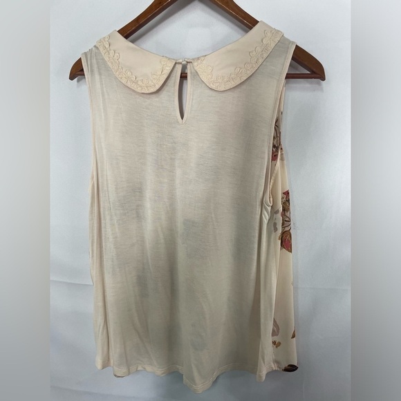 Lauren Conrad sleeveless blouse. Light peach base color w/ a Peter Pan collar. - Picture 2 of 3